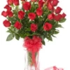 Elegant red roses in glass vase