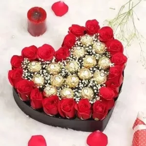 A heart-shaped box with 20 red roses, 16pcs of Italian Ferrero rocher,