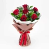 6 red roses, baby's breath and extra seasonal leaves bouquet